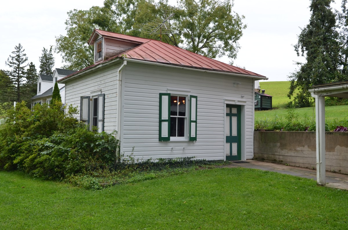 The exterior of the historic summer kitchen building, now the Deerfoot tasting room.